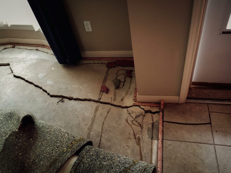 Settled interior slab before foundation leveling
